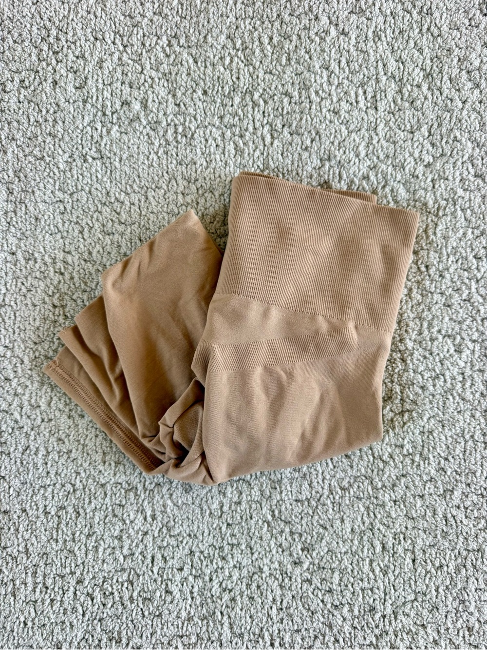 beige ribbed shapewear shorts by Assets by SPANX